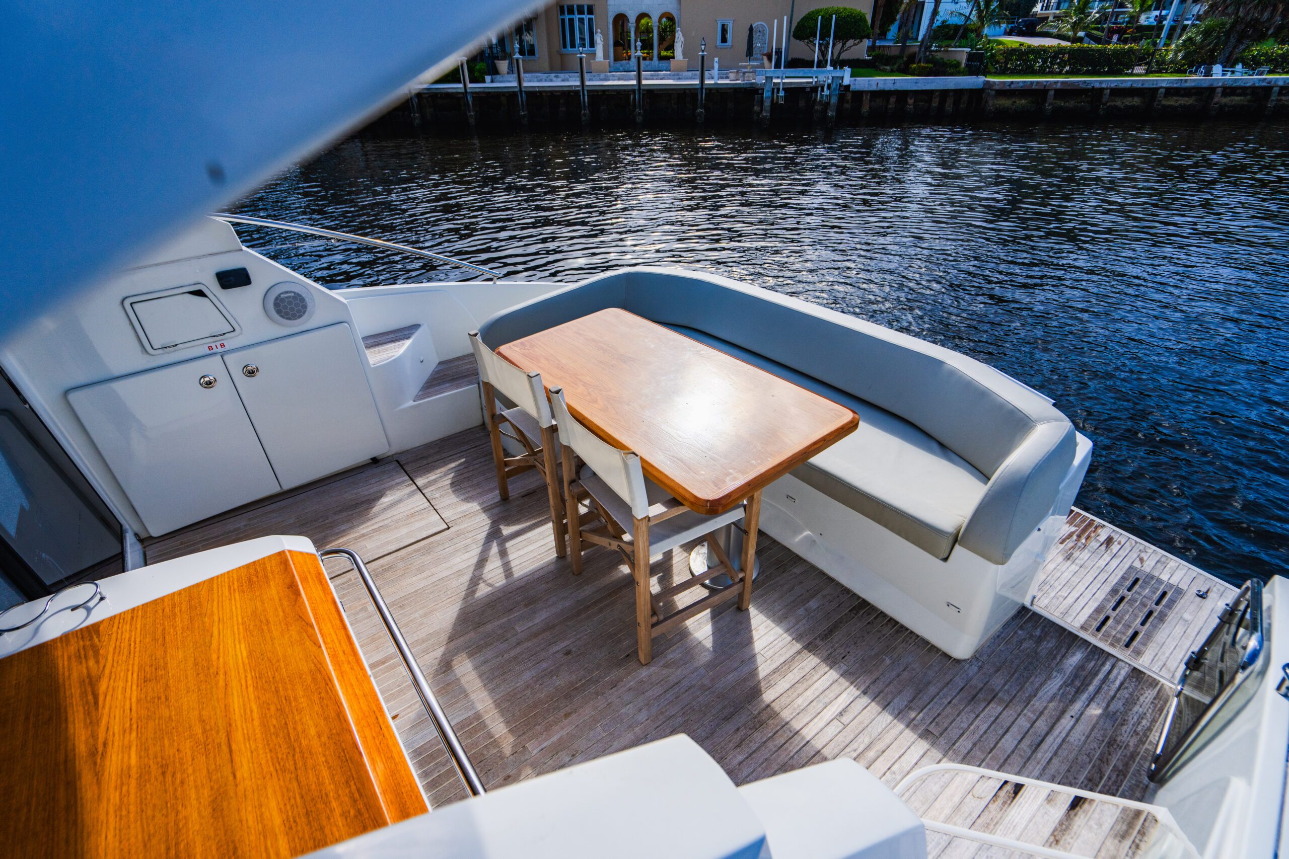Bird's eye photography of a yacht on the water off the Palm Beach coastline