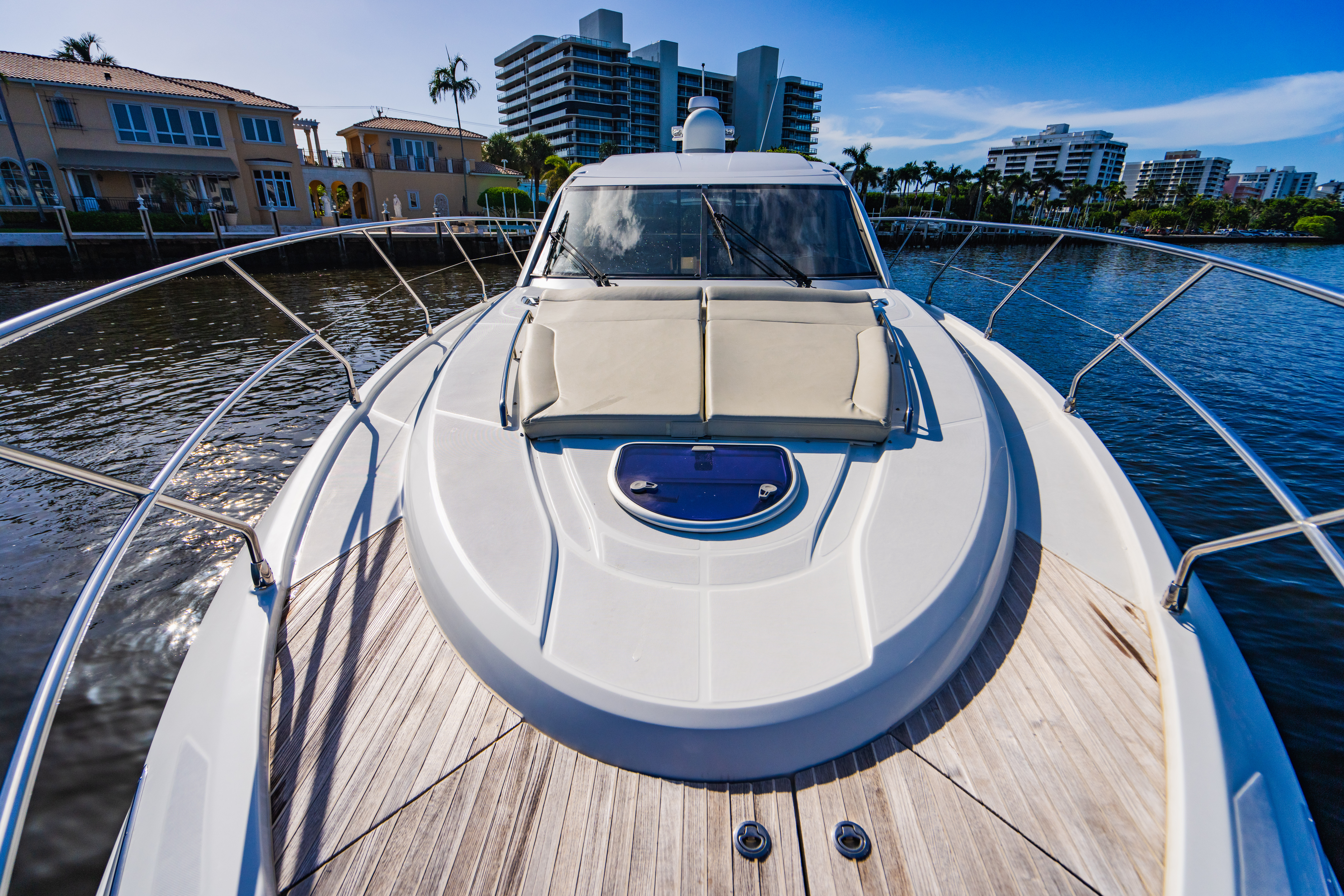 Bird's eye photography of a boat on the water illustrating shared ownership access